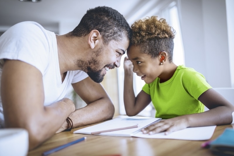 secondary_dad_and_daughter_doing_homework.jpg