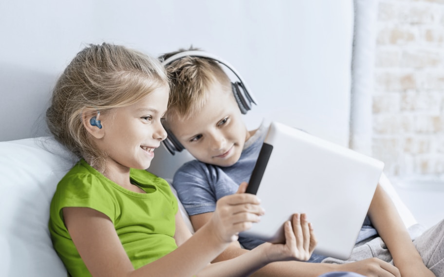 Pediatric - Siblings watching iPad